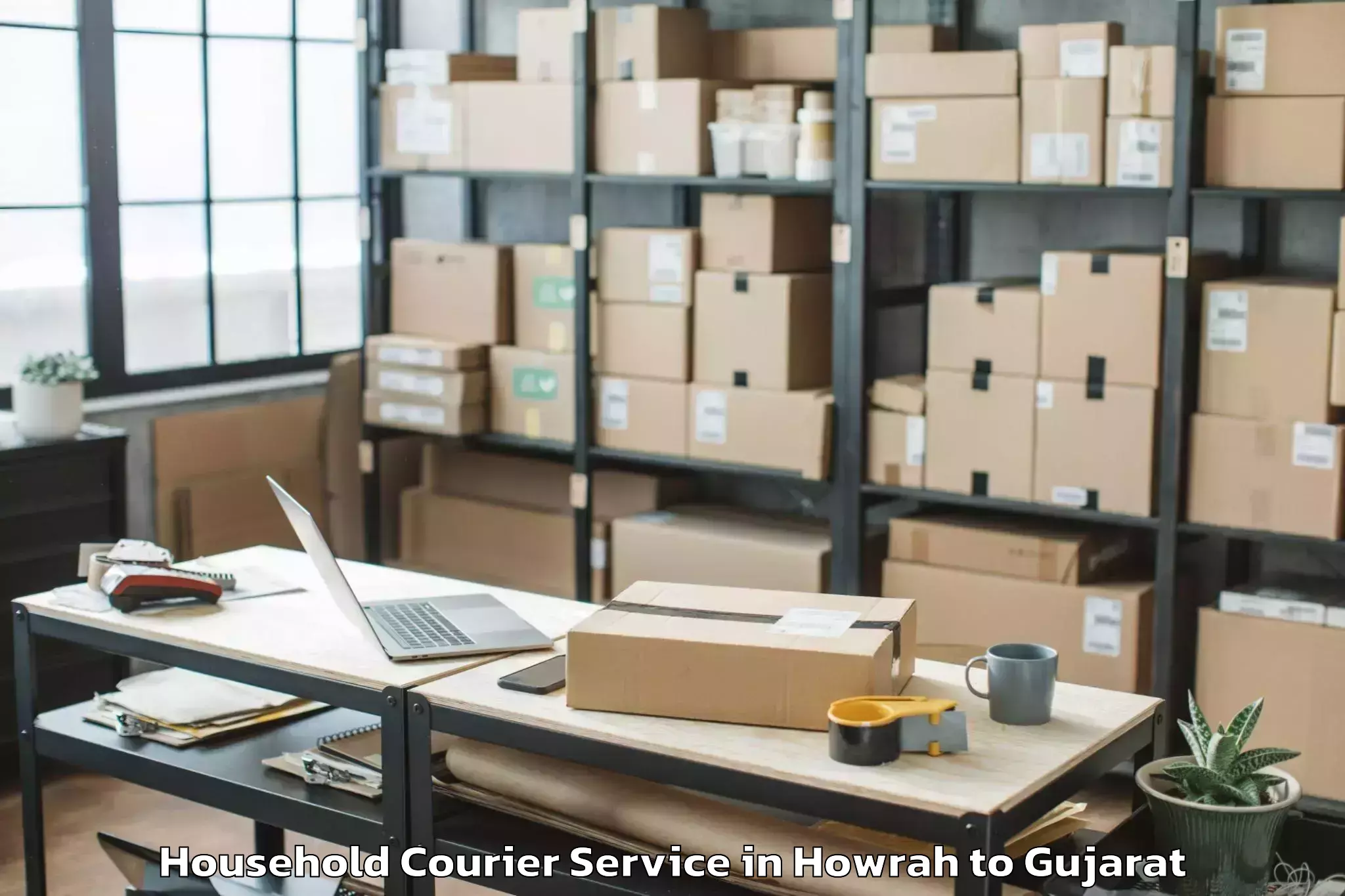 Top Howrah to Bhilad Household Courier Available